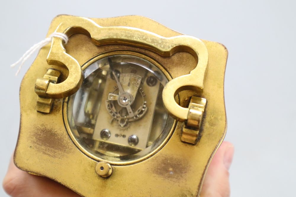 A brass cased carriage clock, height 14cm with handle down